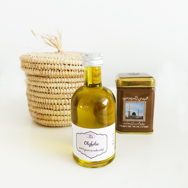 Oummie gift package with handmade Moroccan Raffia basket with pure natural olive oil and Moroccan scented block musk jamid perfume